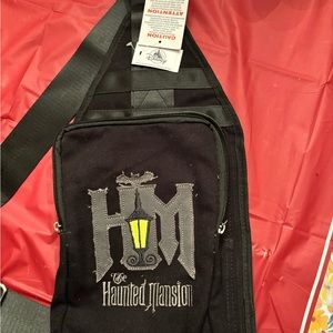 Disney’s Haunted Mansion sling bag with tags